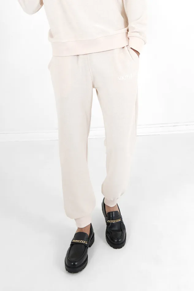 Men Sixth June Paris Jeans Trousers Curly Logo Joggers Beige Men Sixth June Paris Jeans Trousers Curly Logo Joggers Beige